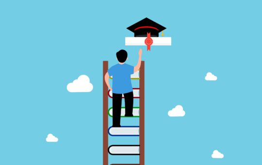 Person on a ladder reaching for a graduate hat as the adoption of generative AI has outpaced workforce capability, prompting OpenAI to target the skills gap with new certification standards.