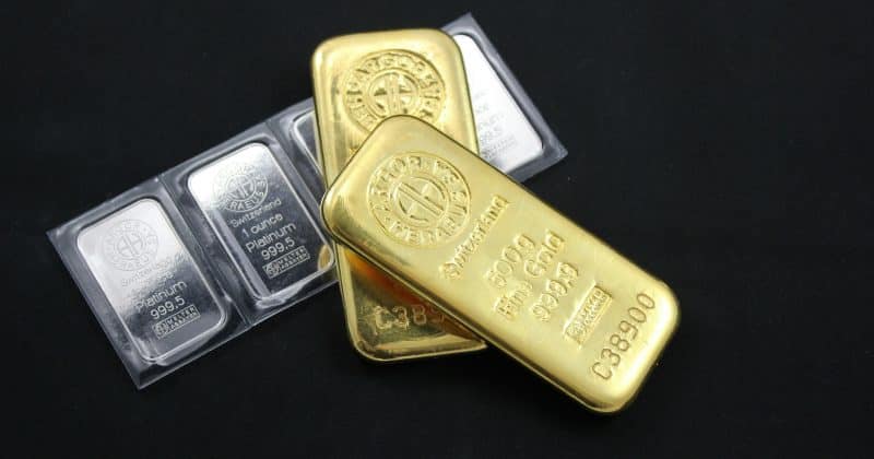 Gold surges past $5,000 for first time as silver tops $107 on safe-haven buying