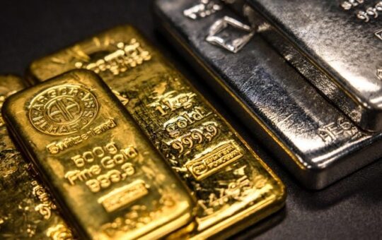 Silver tops $100 as gold nears $5,000 on extraordinary metals rally