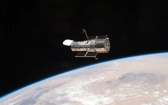 Hubble Image Shows Gravity Warping Distant Galaxies