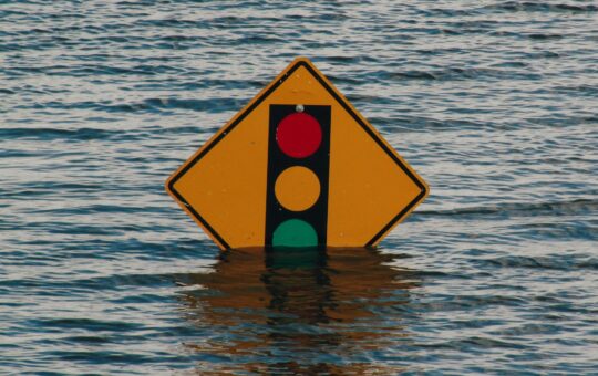 Sign in a flood as MIT engineers have built an AI tool that forecasts extreme weather without training on historical disaster data.